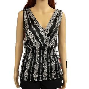 White House Black Market top sleeveless size Med in EUC.  100% silk